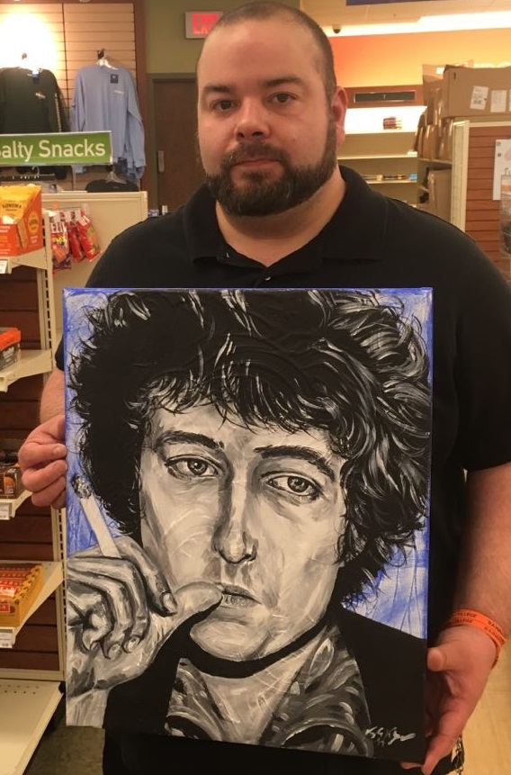 Person holding painting